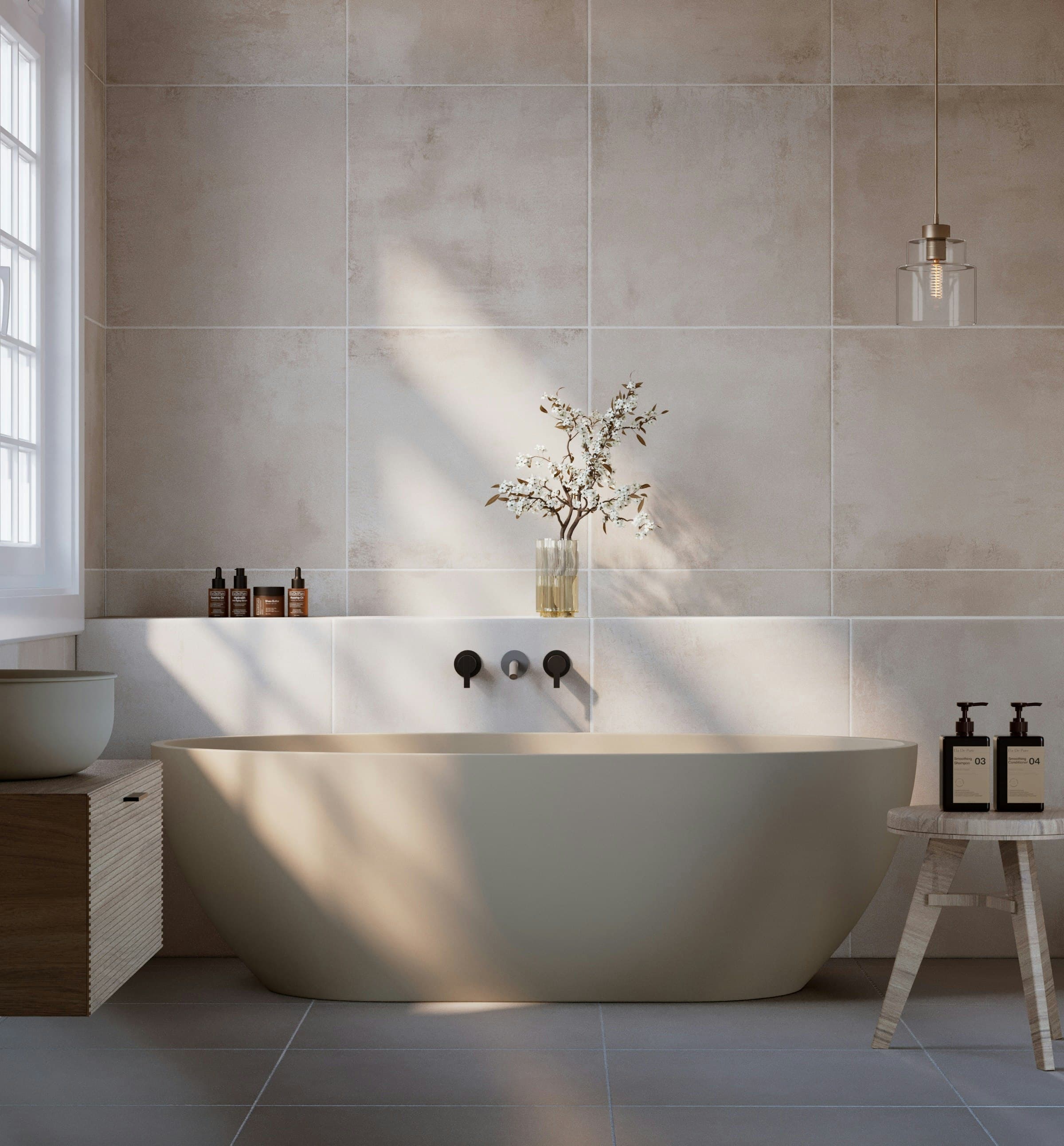 Spa bathroom with a freestanding soaking tub in soft daylight