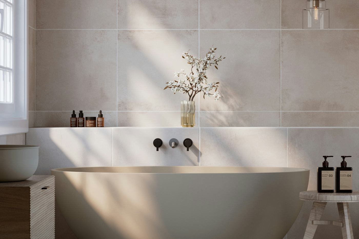 Freestanding soaking tub with wall-mounted fixtures