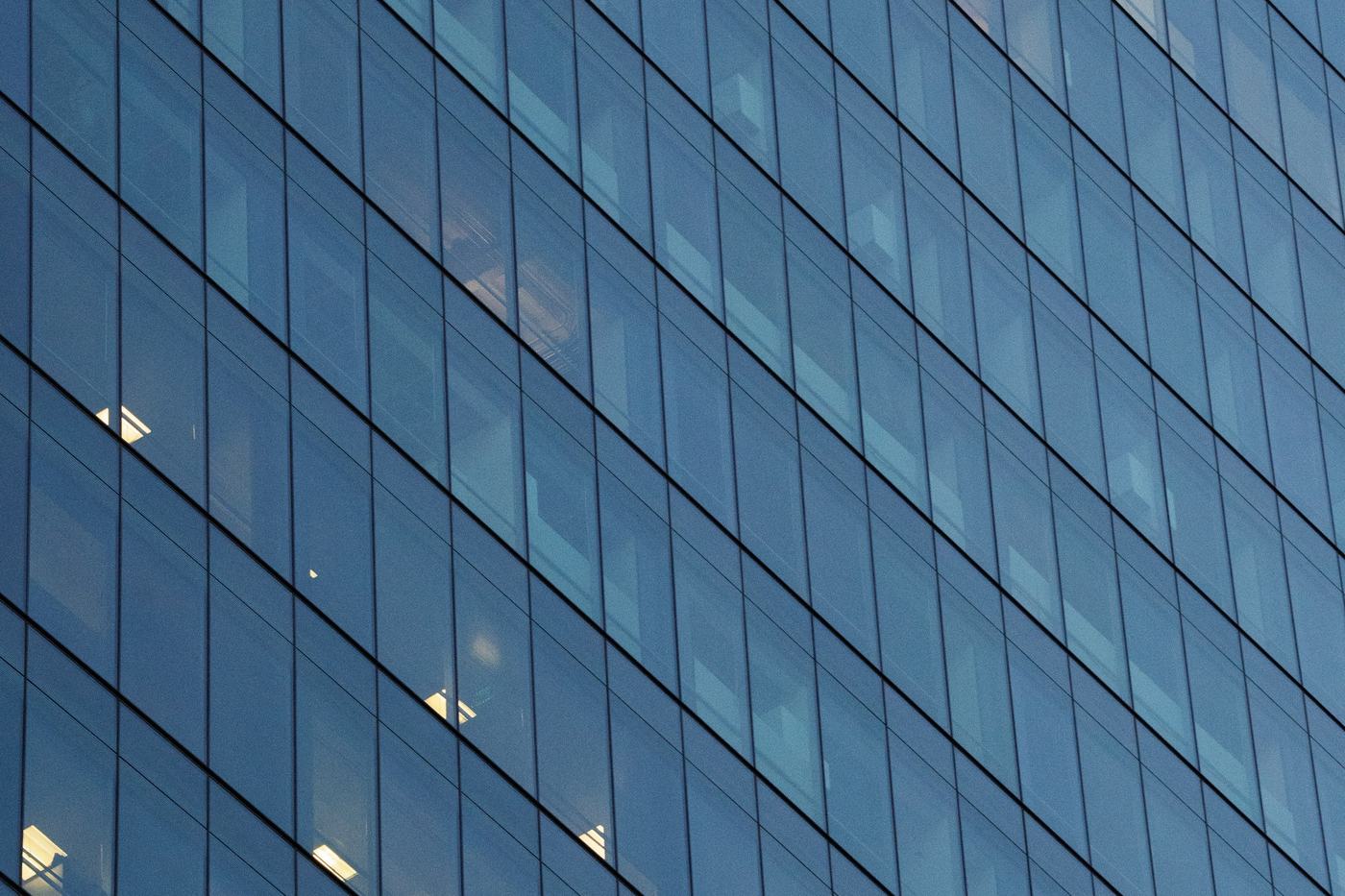Glass curtain wall of a modern commercial tower